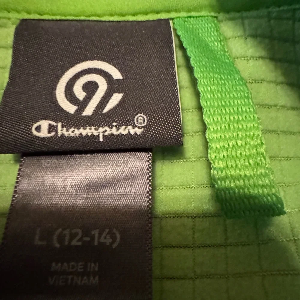 Champion Outdoor Coat/Jacket in black with green accents Boys size L (12/14)